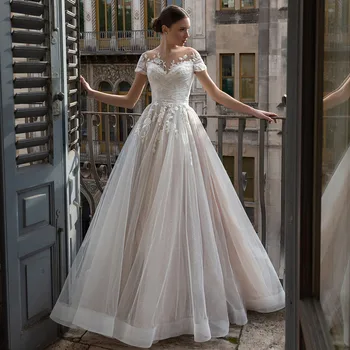 Sparkly düğün elbisesi Bir Çizgi Kısa Kollu Şeffaf Bateau Süpürme Illusion Gelinlikler Prenses Aplike Backless gelin elbiseleri